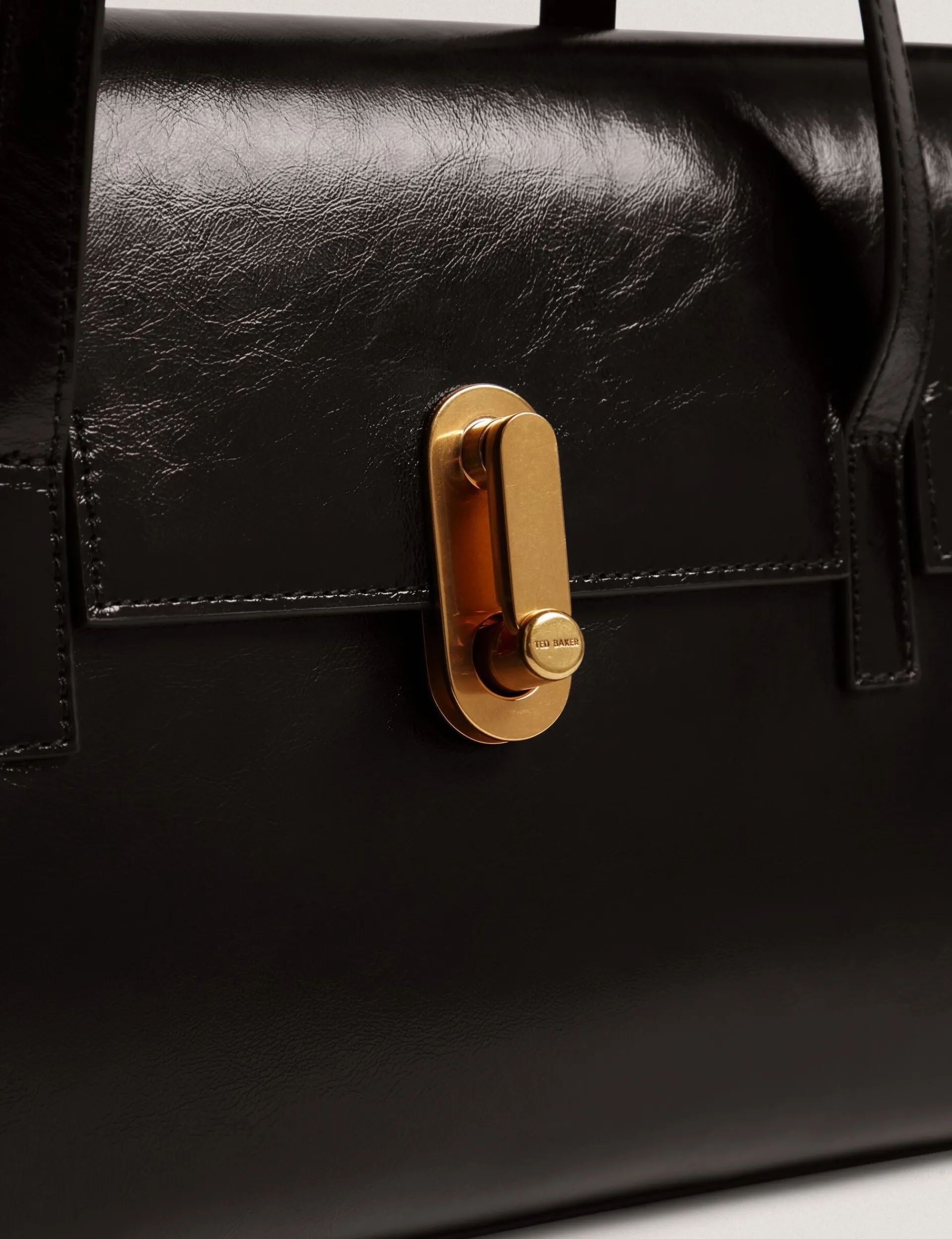 New Lobster Limited Schultertaschen<Baguette-Tasche aus geknittertem Leder mit Drehverschluss