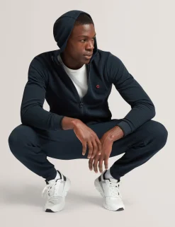 Licensee Batra Group Sportbekleidung<Jogginganzug mit Piquet-Bündchen